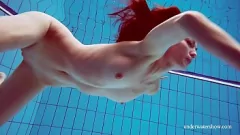 Play Wet and Wild: Brunette Teen in Blue Bikini Gets Naughty in the Pool